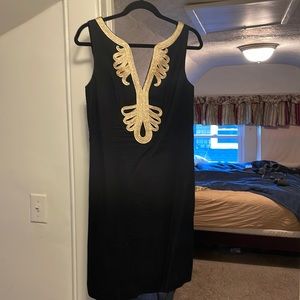 Beautiful black and gold Lilly dress in good used condition.